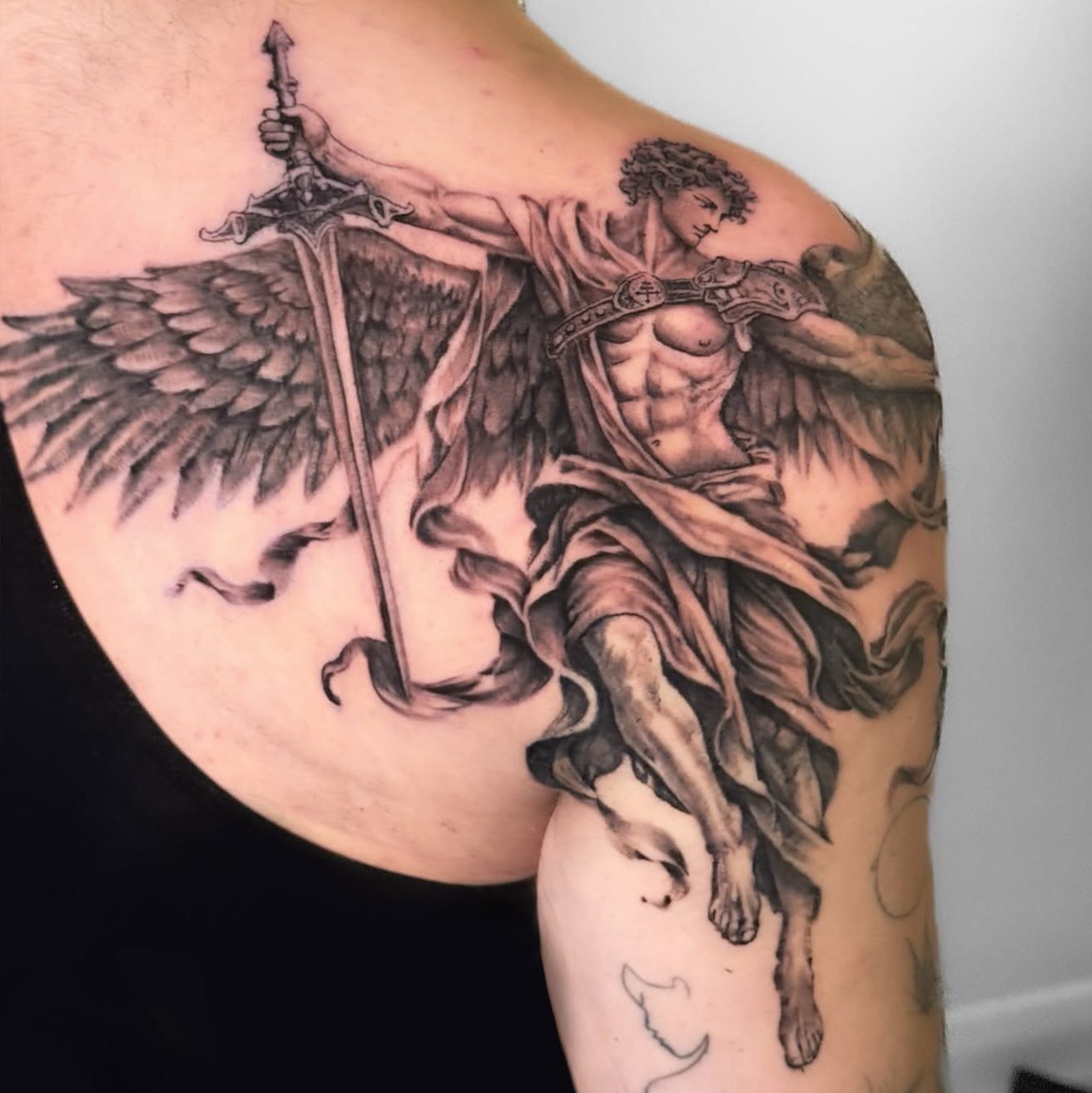 Black and grey realism tattoo by Kacper Mamcarczyk